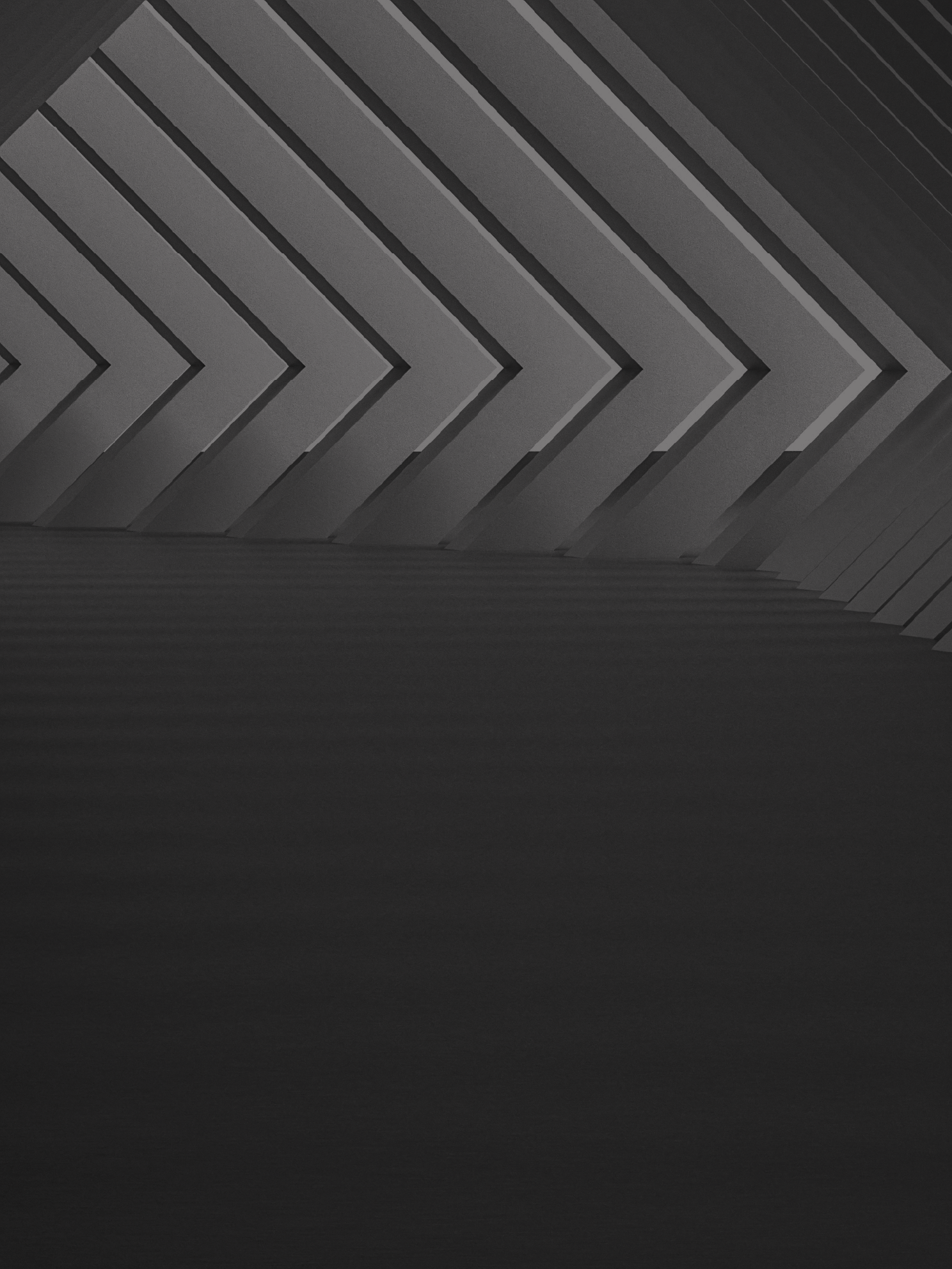 Dark gray geometric pattern on a black background