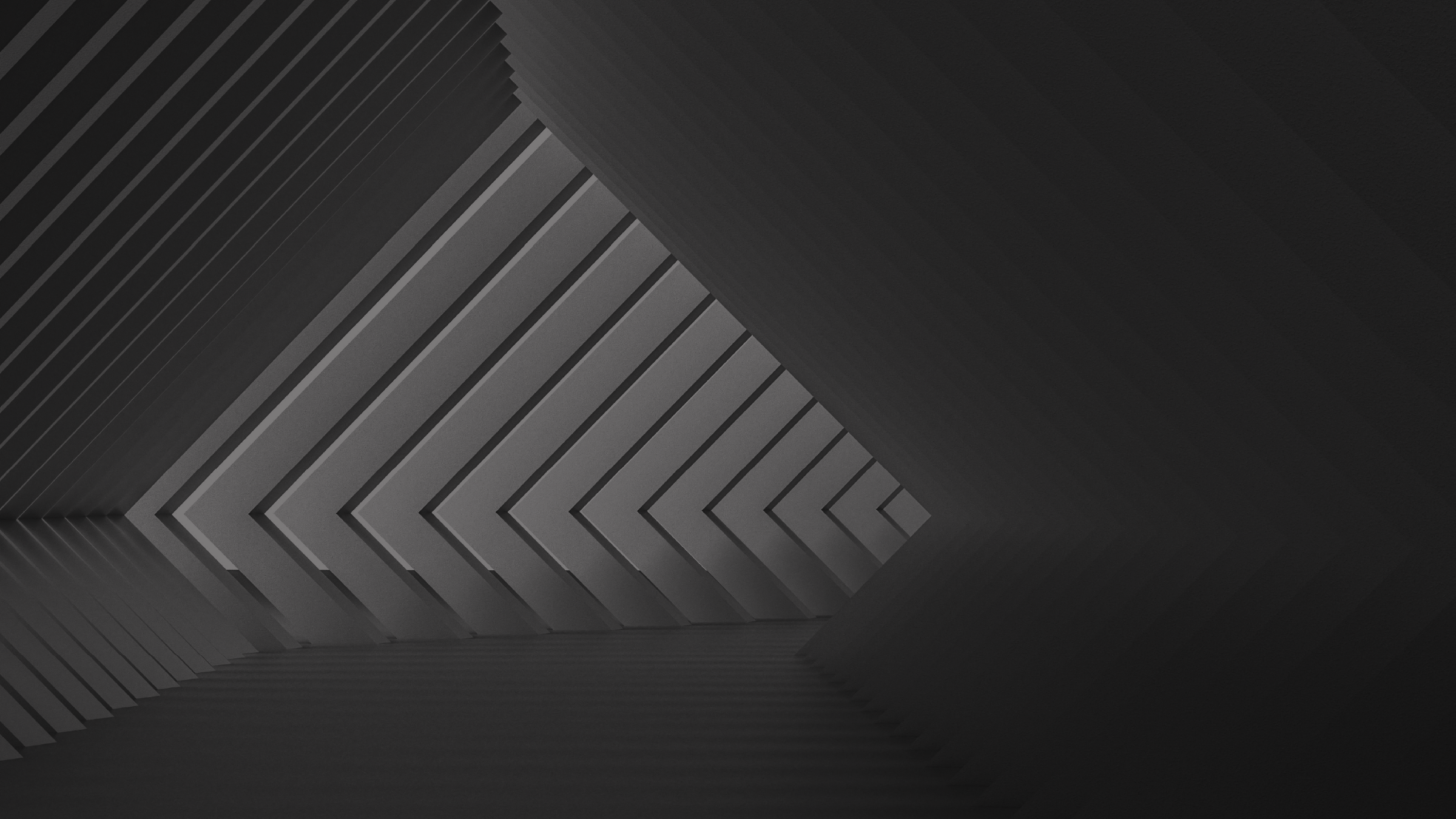 Black and white geometric pattern on a dark background