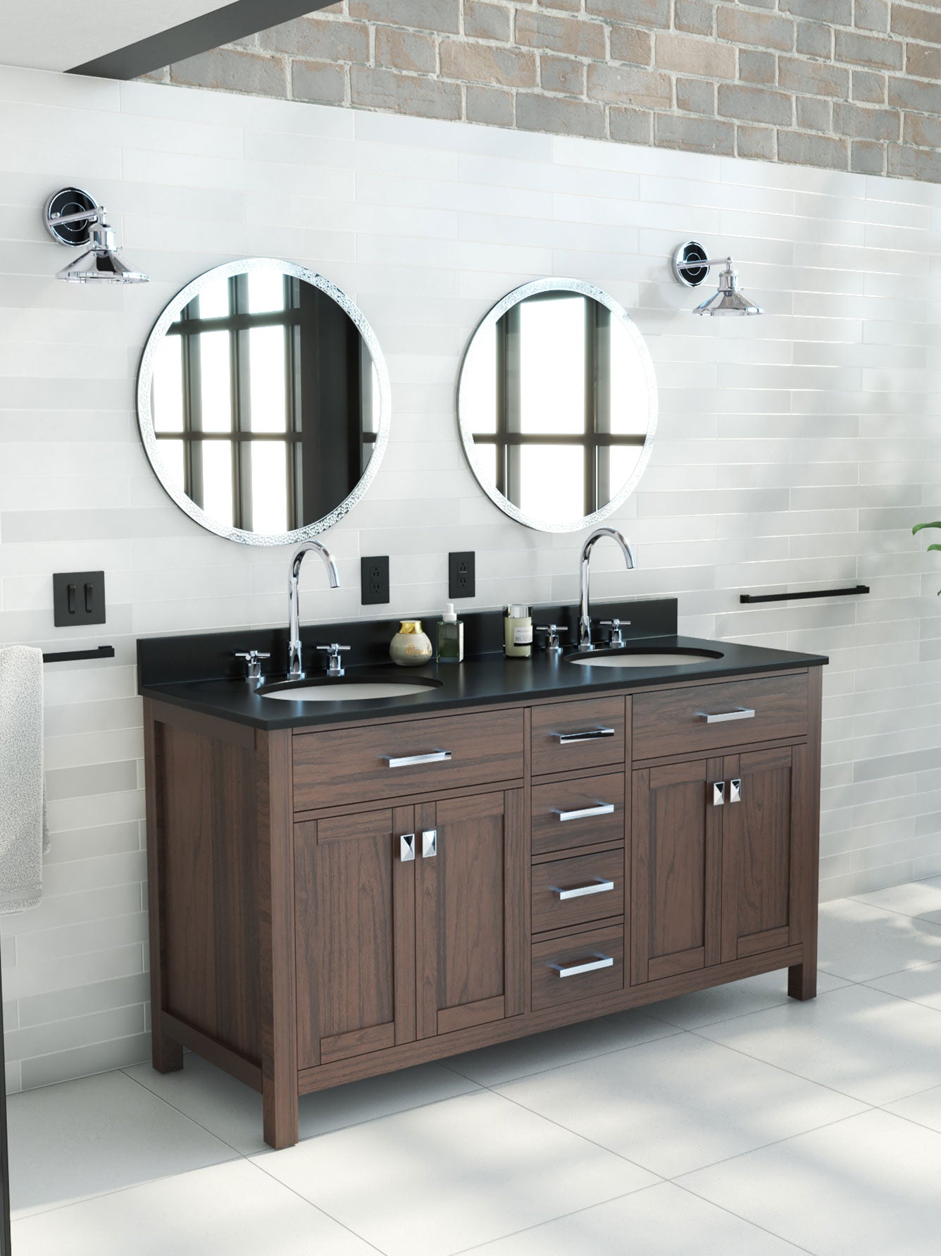 Bathroom vanity with double sink and round mirrors against a tiled wall.