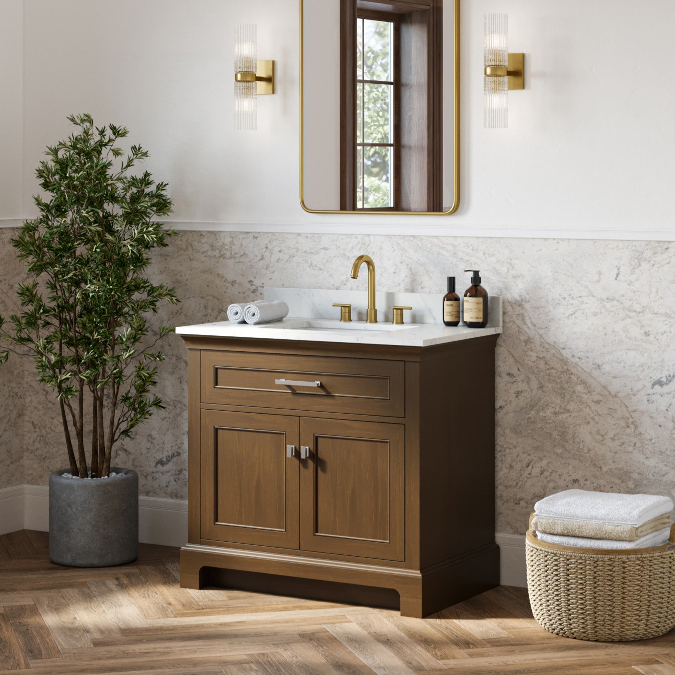 Bathroom with wooden vanity, mirror, and decorative elements